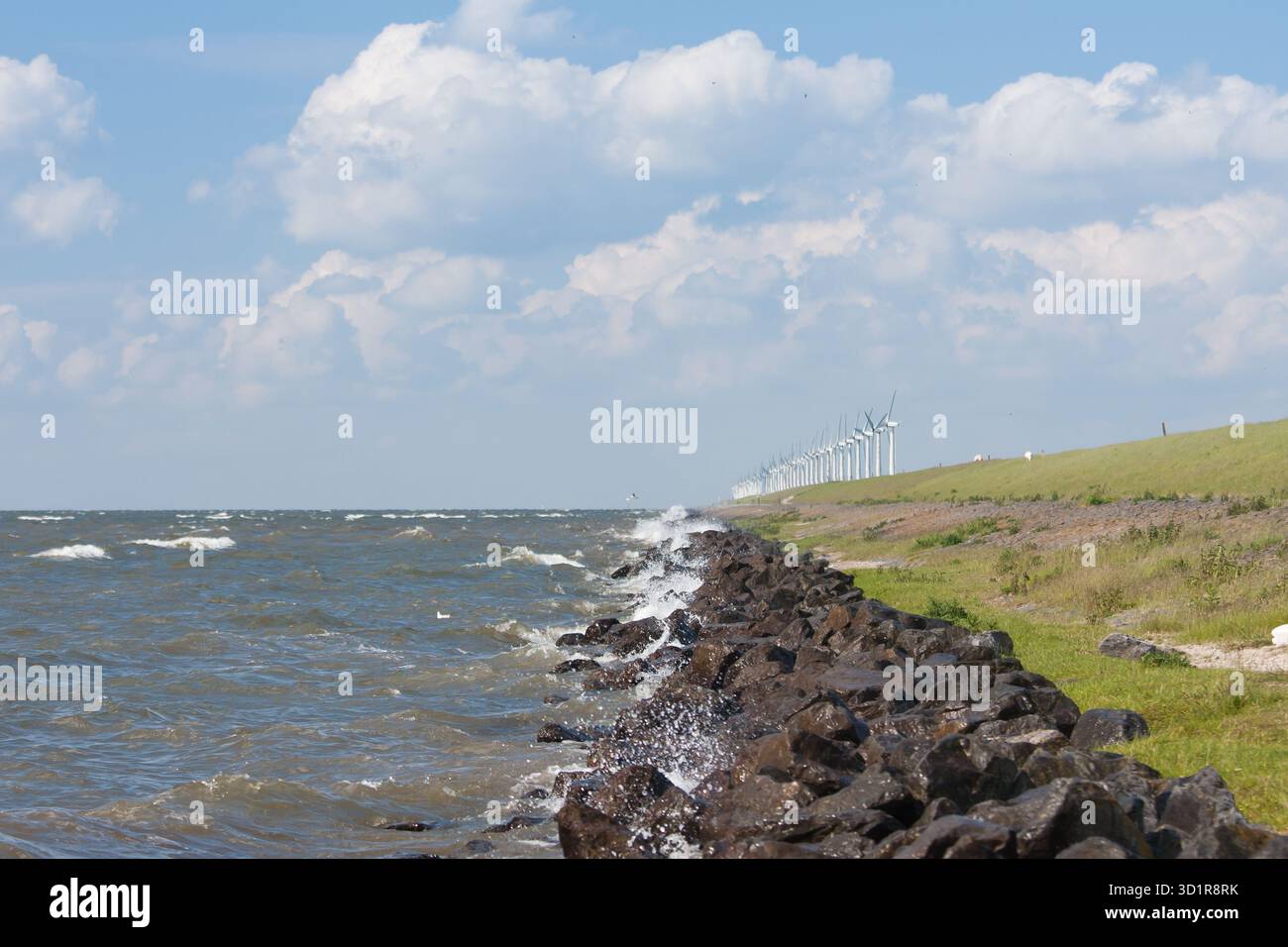 Dike with windmills  in the Netherlands Stock Photo