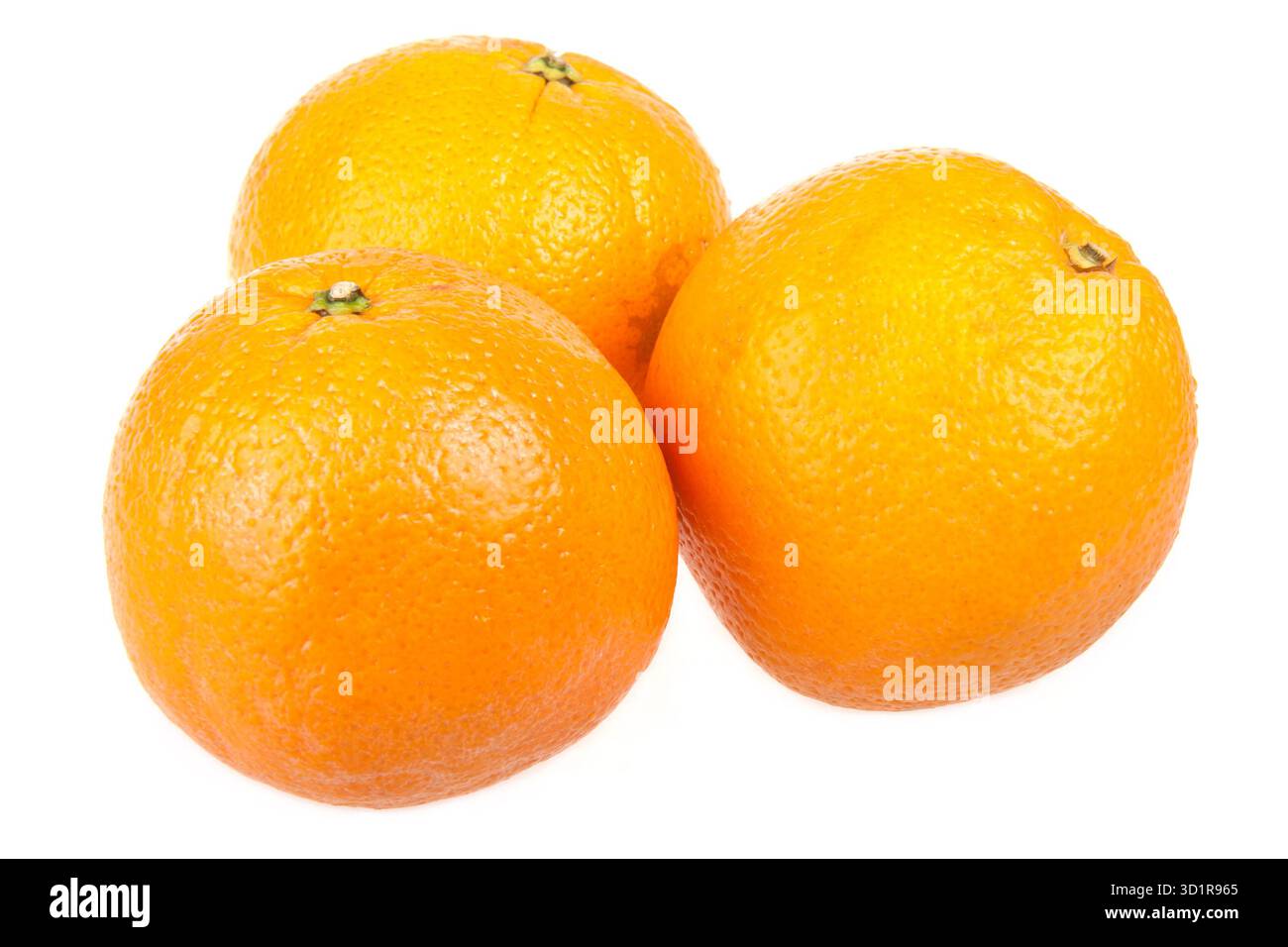 Three fresh oranges isolated on white Stock Photo