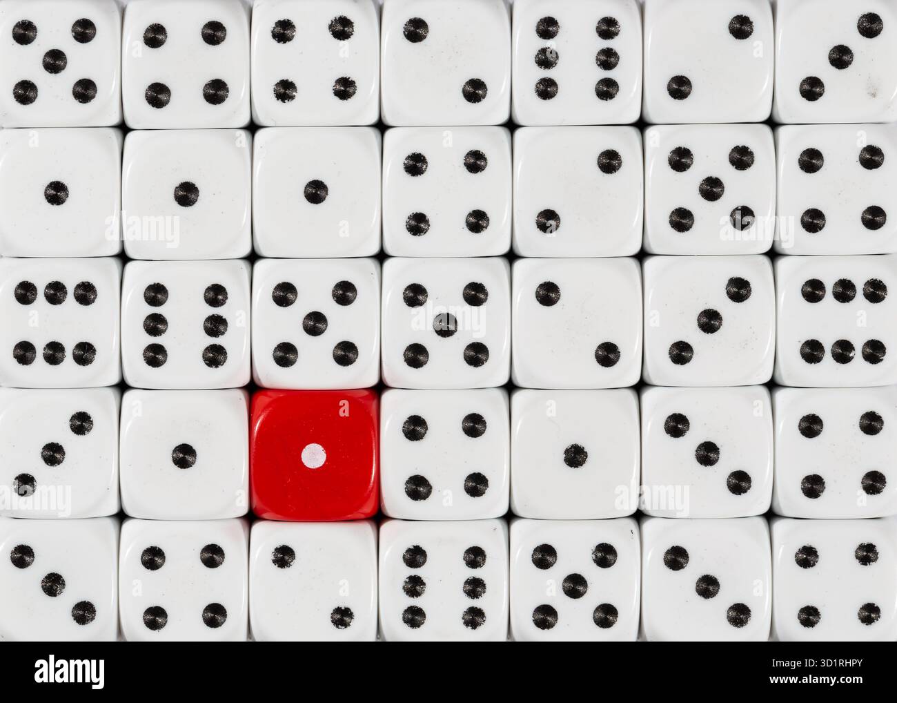 Background of random ordered white dices with one red cube Stock Photo