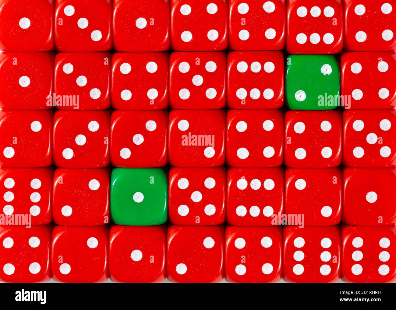 Background of random ordered red dices with two green cubes Stock Photo