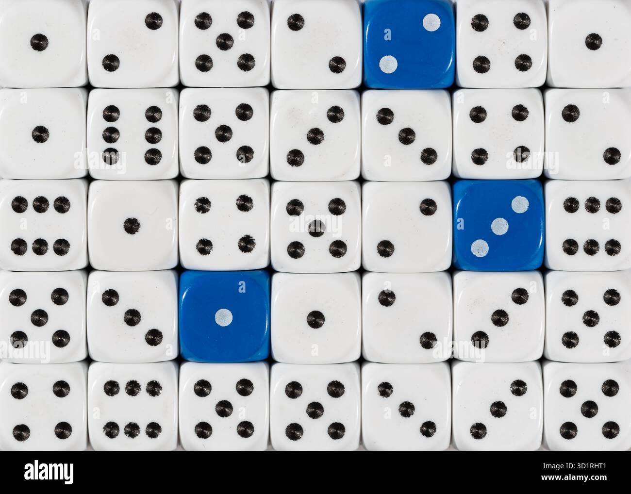 Background of random ordered white dices with three blue cubes Stock Photo