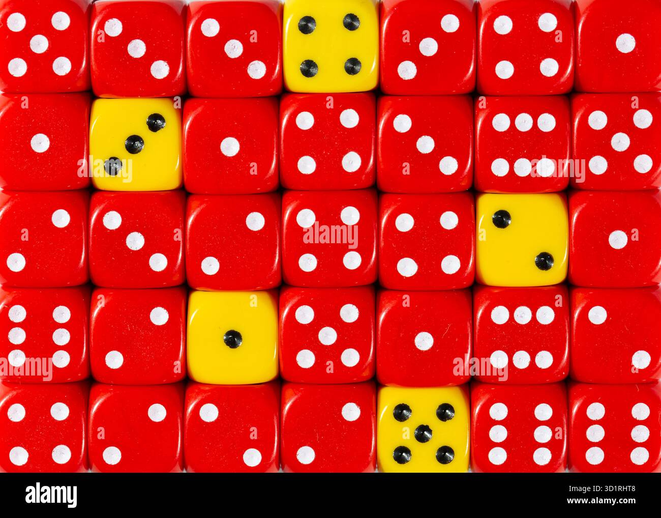 Background of random ordered red dices with five yellow cubes Stock Photo