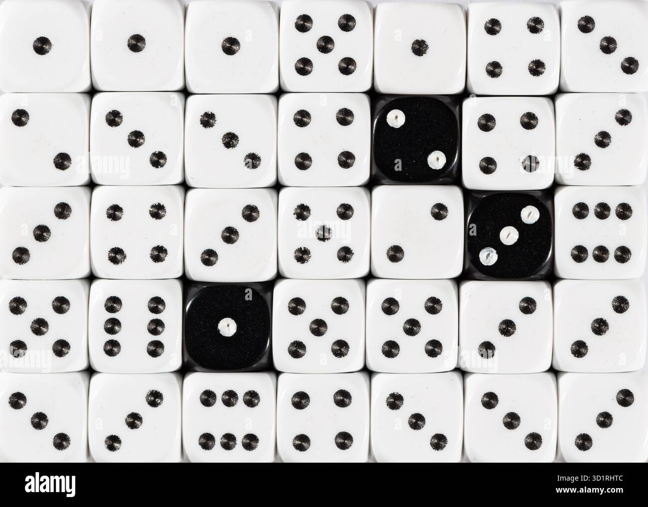 Background of random ordered white dices with three black cubes Stock Photo