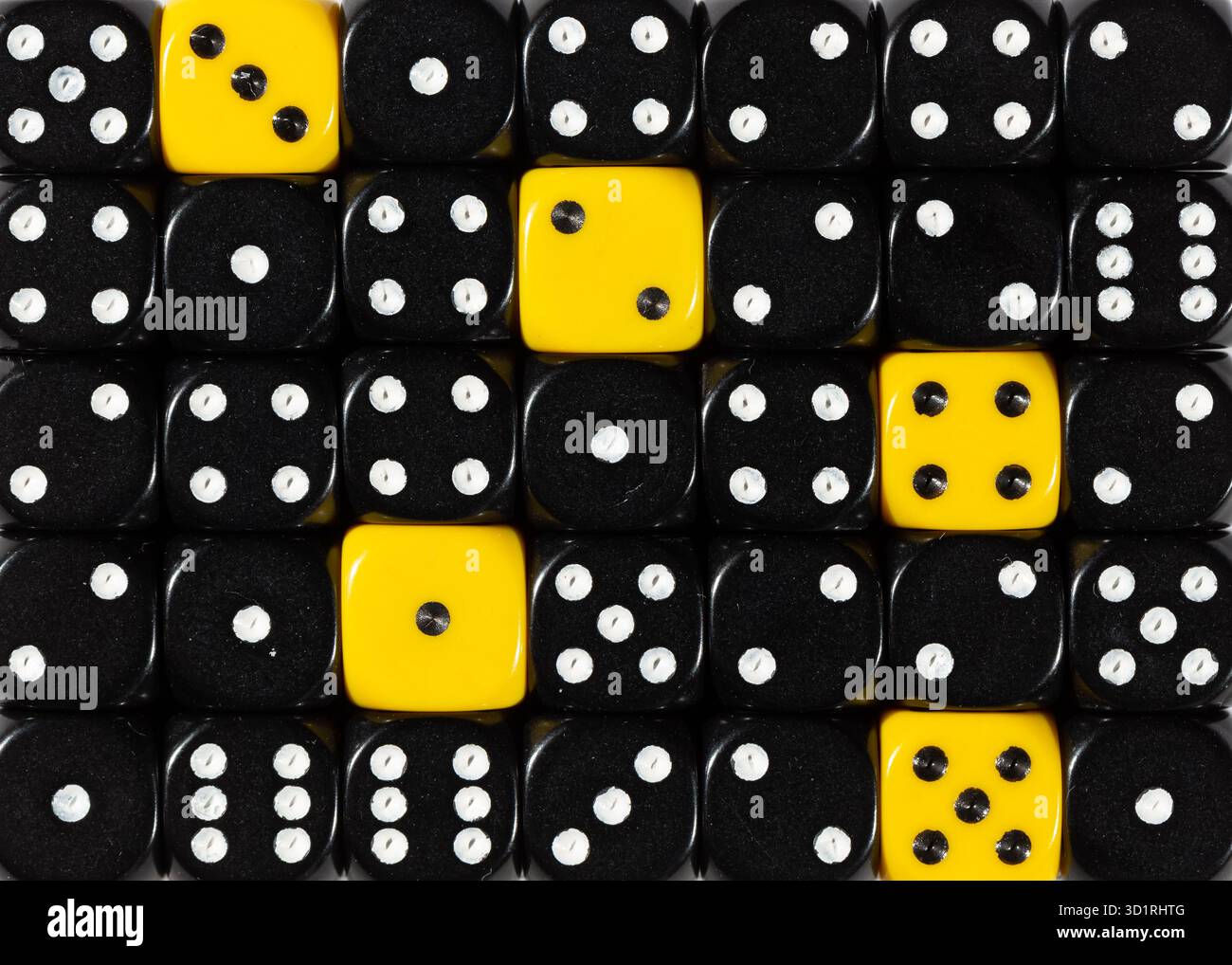 Background of random ordered black dices with five yellow cubes Stock Photo