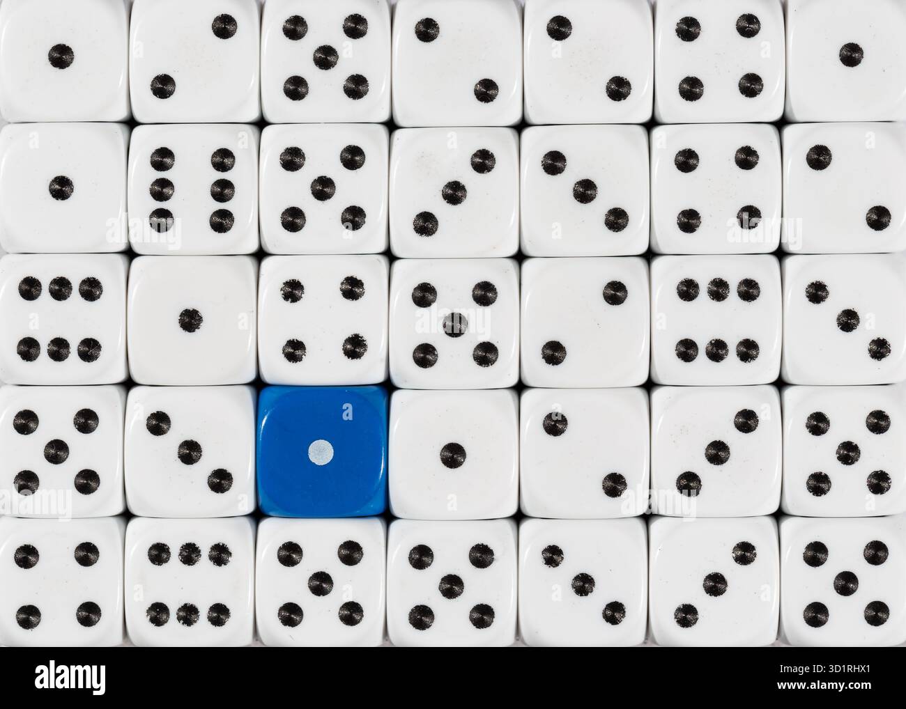 Background of random ordered white dices with one blue cube Stock Photo