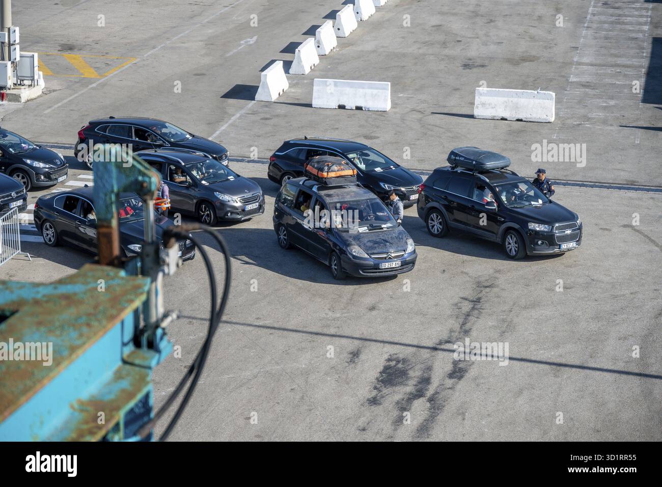Tanger Med, Fahs-Anjra - Morocco - 08-22-2024: Several vehicles queuing ...