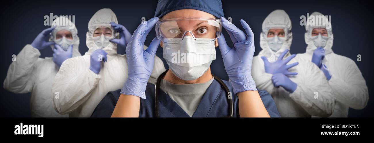 Team of Female and Male Doctors or Nurses Wearing Protective Medical Face Masks and Goggles Banner Stock Photo