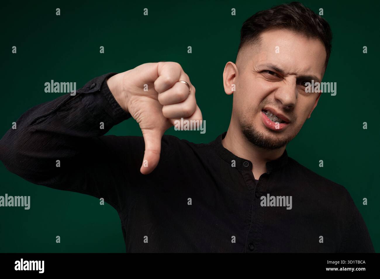 Man Making Thumbs Up Gesture Stock Photo