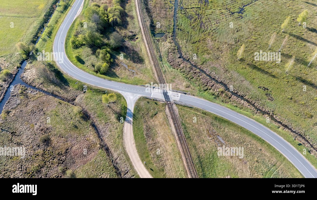 Intersection In Rural Aerial view of a rural road intersection with railway tracks Stock ...