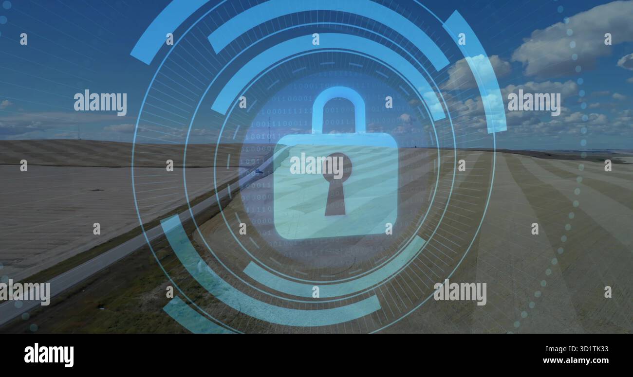 Displaying central padlock icon securing rural farmland via digital interface, binary code overlay Stock Photo