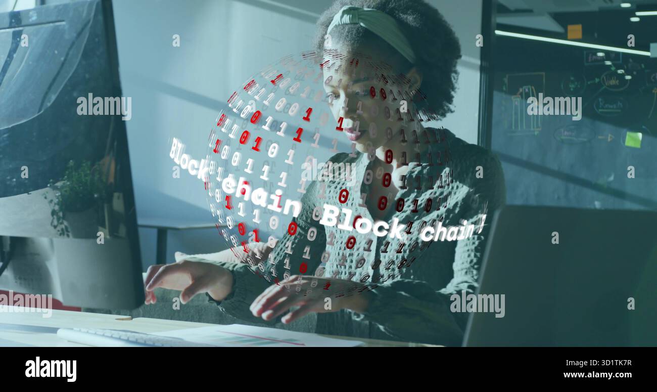 Typing software engineer at modern office desk with holographic ...