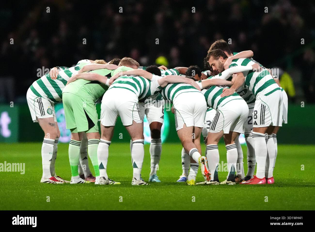 Celtic players form a huddle before the William Hill Premiership match ...