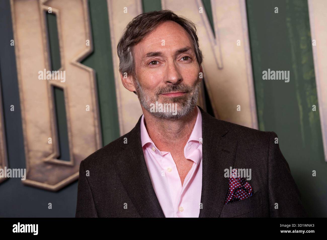 Jonathan English poses upon arrival at the premiere of the series ...