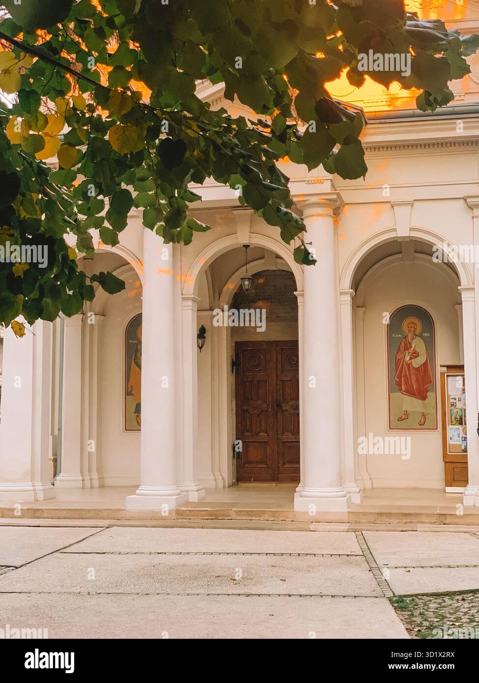 Historic Streets of Bucharest, Romania Bathed in Golden Sunset Light - Smartphone Captured Stock Image