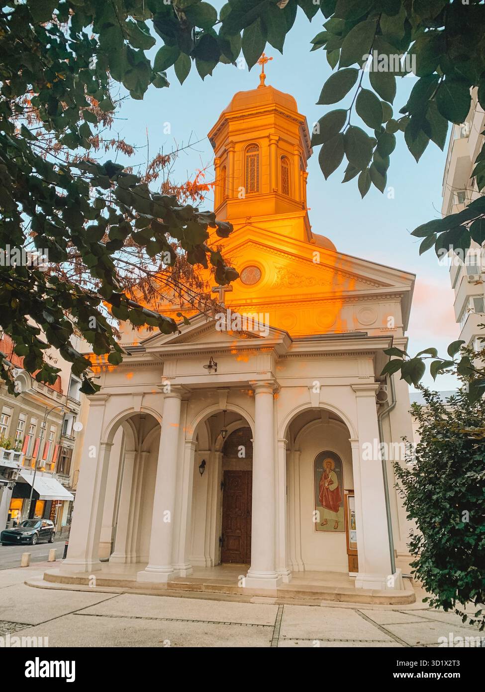 Historic Streets of Bucharest, Romania Bathed in Golden Sunset Light - Smartphone Captured Stock Image