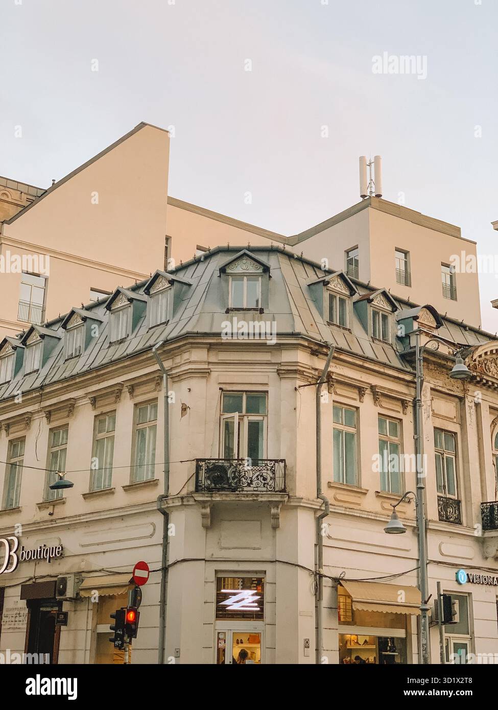 Historic Streets of Bucharest, Romania Bathed in Golden Sunset Light - Smartphone Captured Stock Image