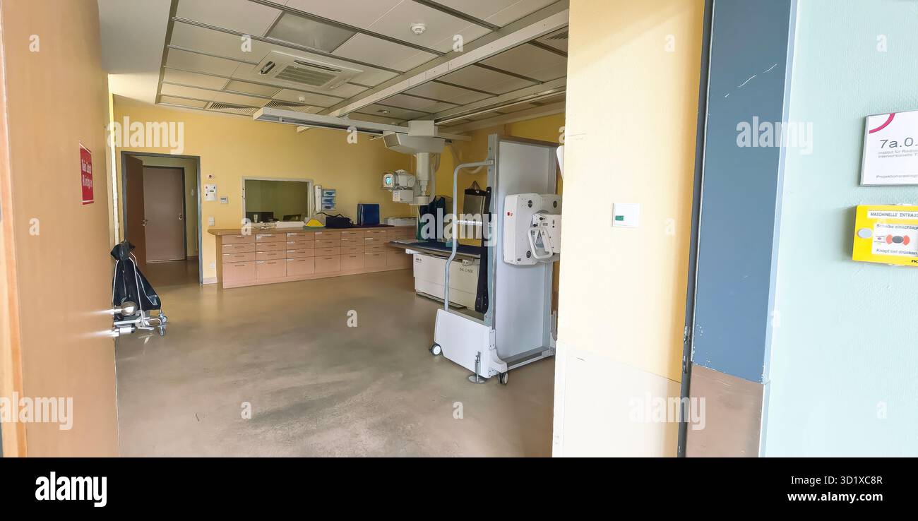 Berlin, Germany - June 16, 2025: Hospital interior features medical equipment in a clean, bright environment with spacious layout. - Smartphone Captured Stock Image