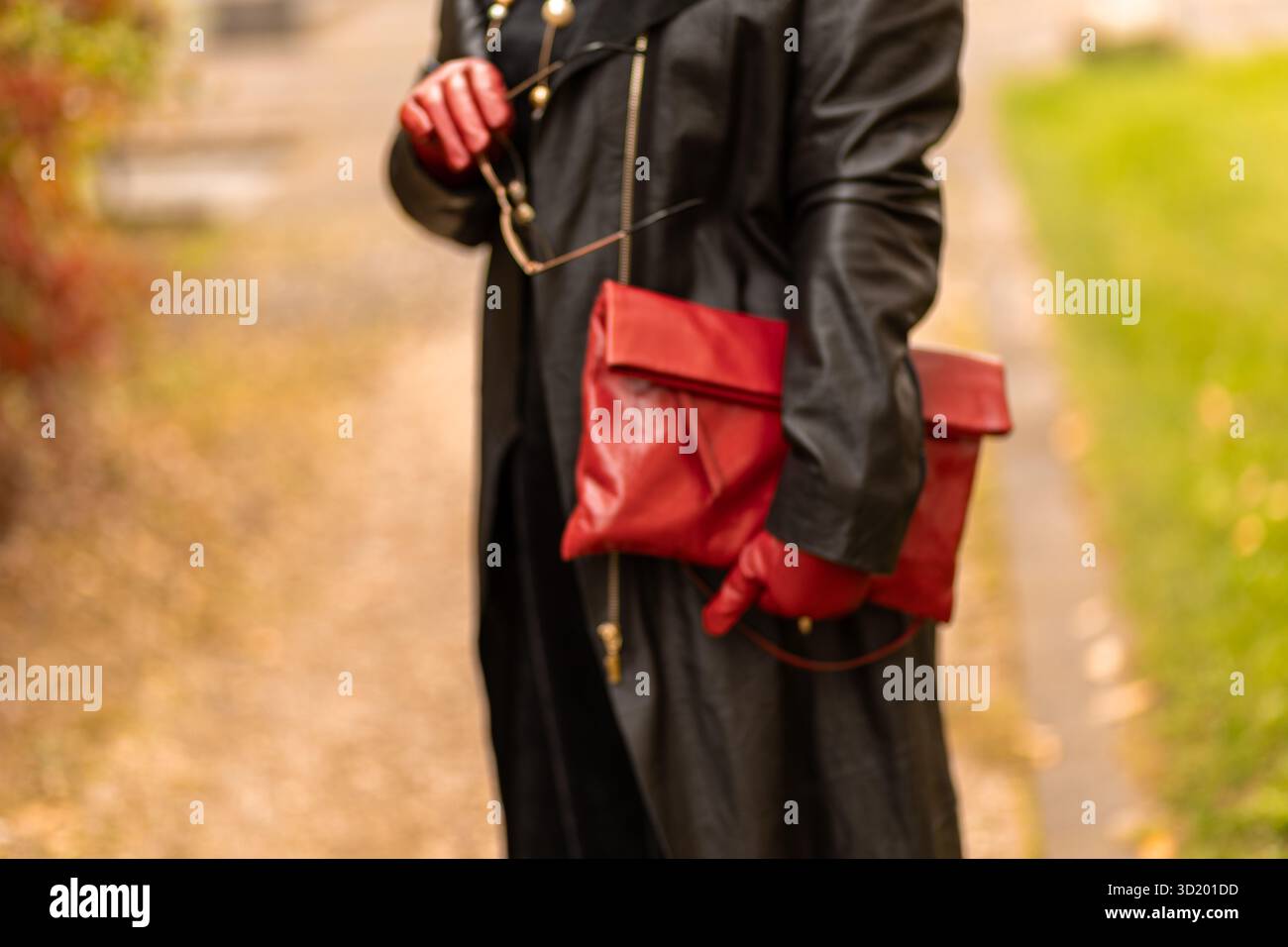 Long cool woman in a black dress hi-res stock photography and images - Alamy