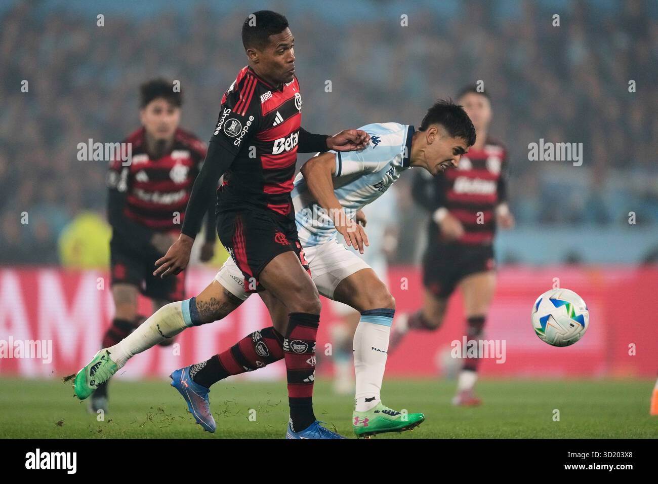 Alex Sandro of Brazil's Flamengo, left, and Santiago Solari of ...