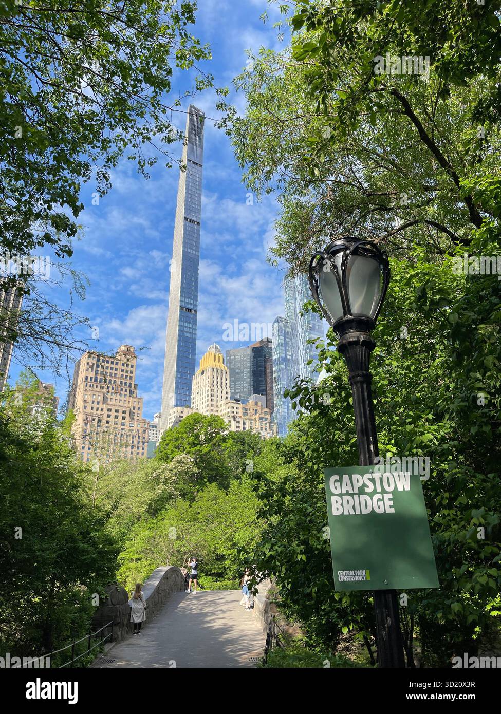 Gapstow Bridge, Central Park NYC — timeless stone arch reflected beautifully through the four seasons. - Smartphone Captured Stock Image