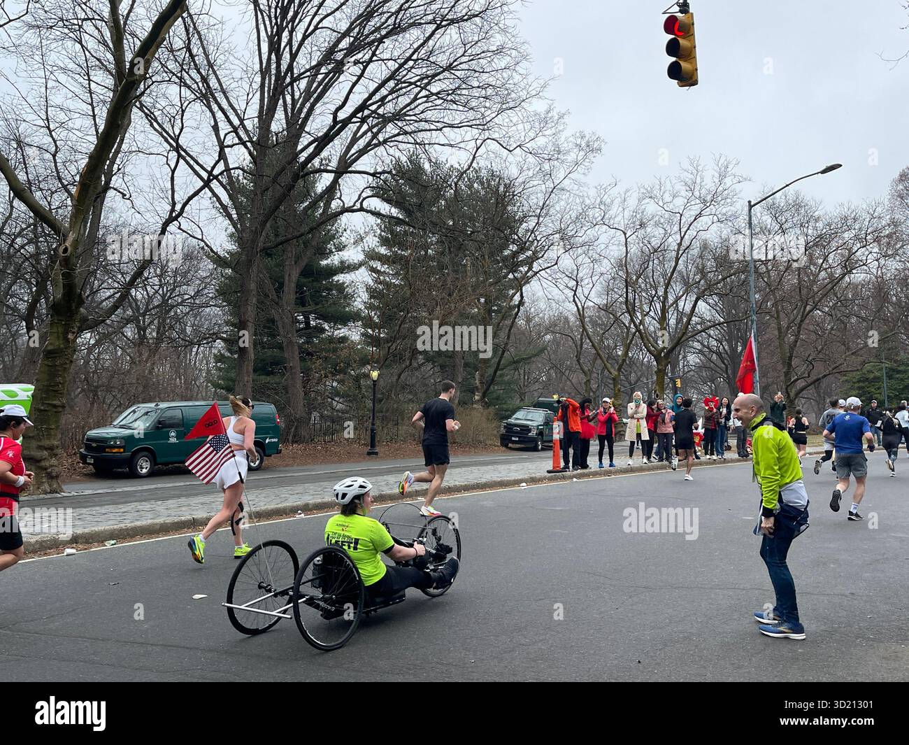 Central Park comes alive with cheers and support for the racing participants - Smartphone Captured Stock Image