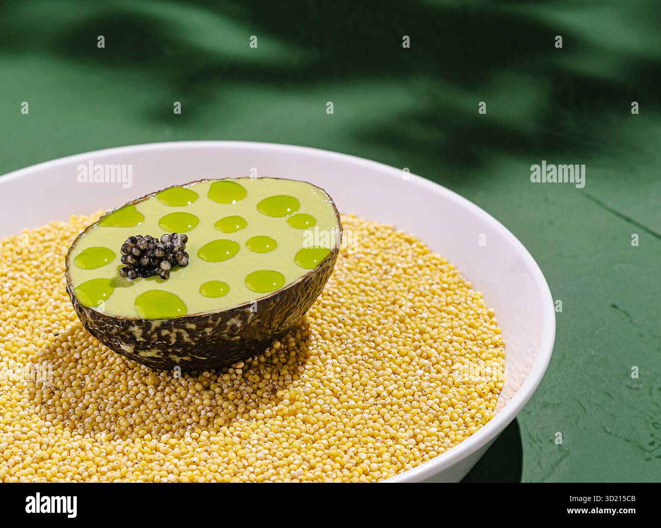 Unique culinary presentation featuring avocado on a bed of grains with ...