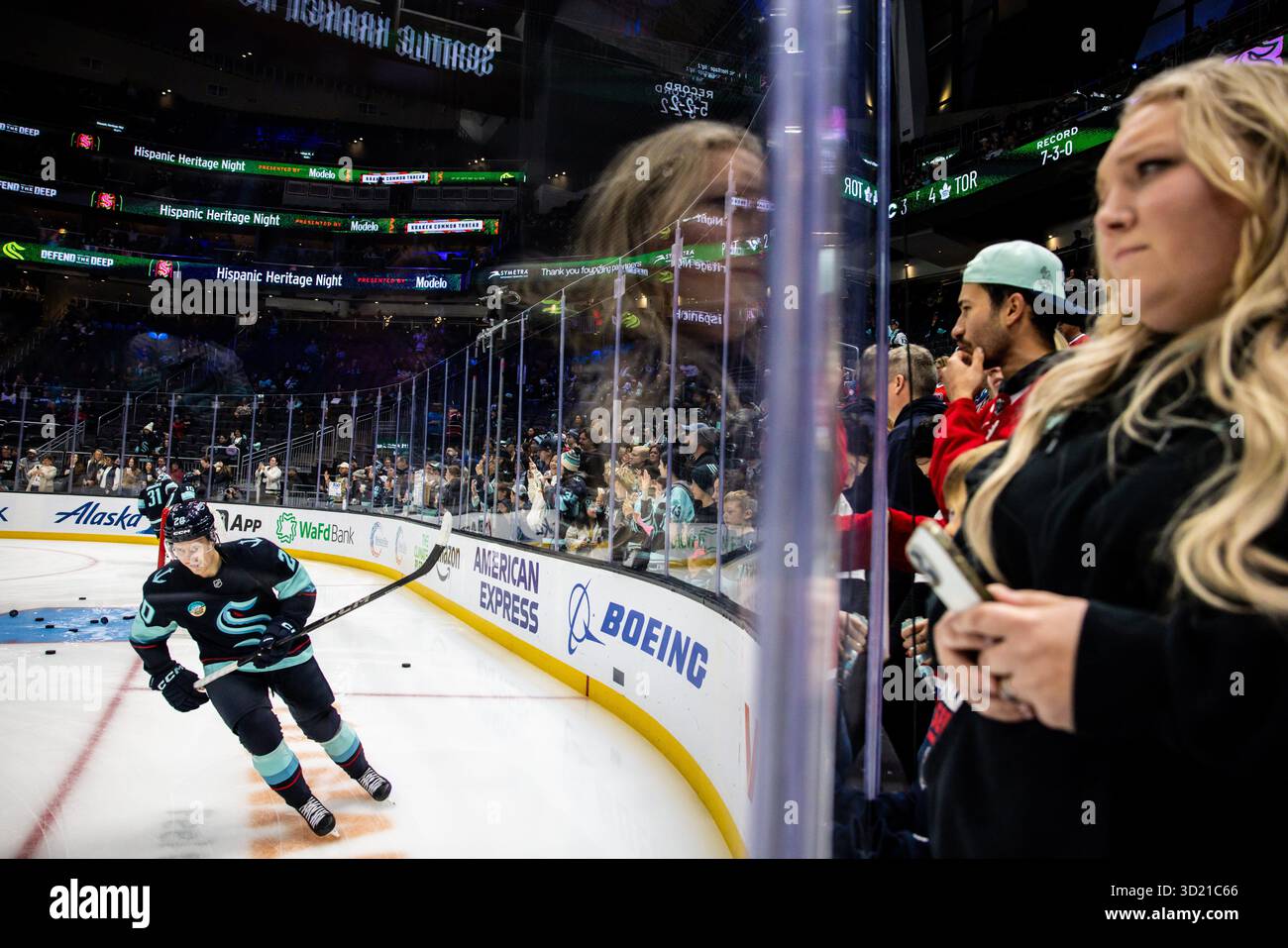 Seattle Kraken right wing Eeli Tolvanen skates during warmups before an ...
