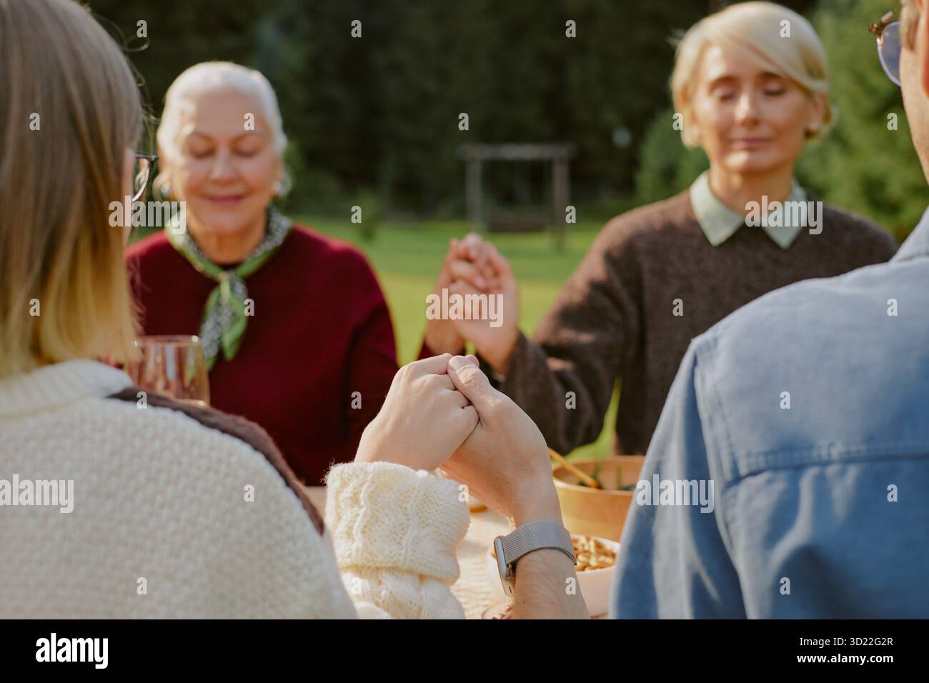 Family praying together hi-res stock photography and images - Alamy