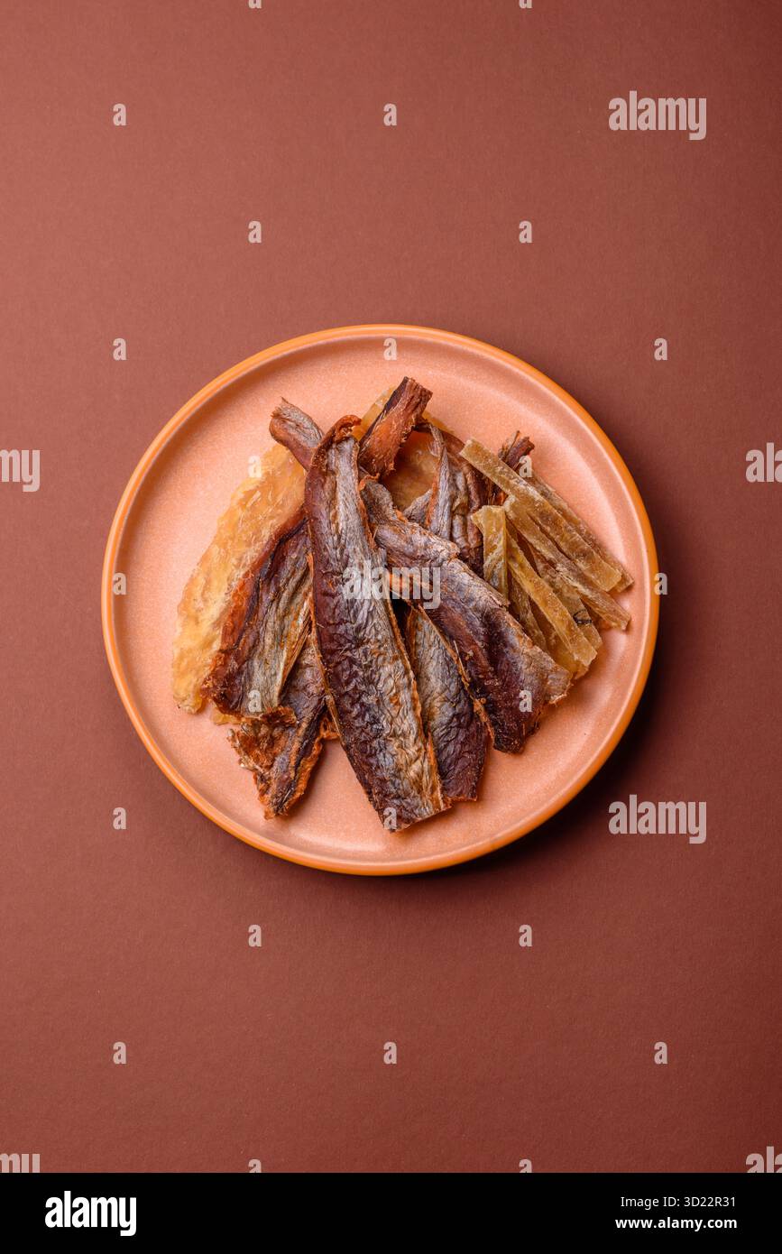 Dried salted fish as snacks or jerky, seafood as slices. Dried seafood ...