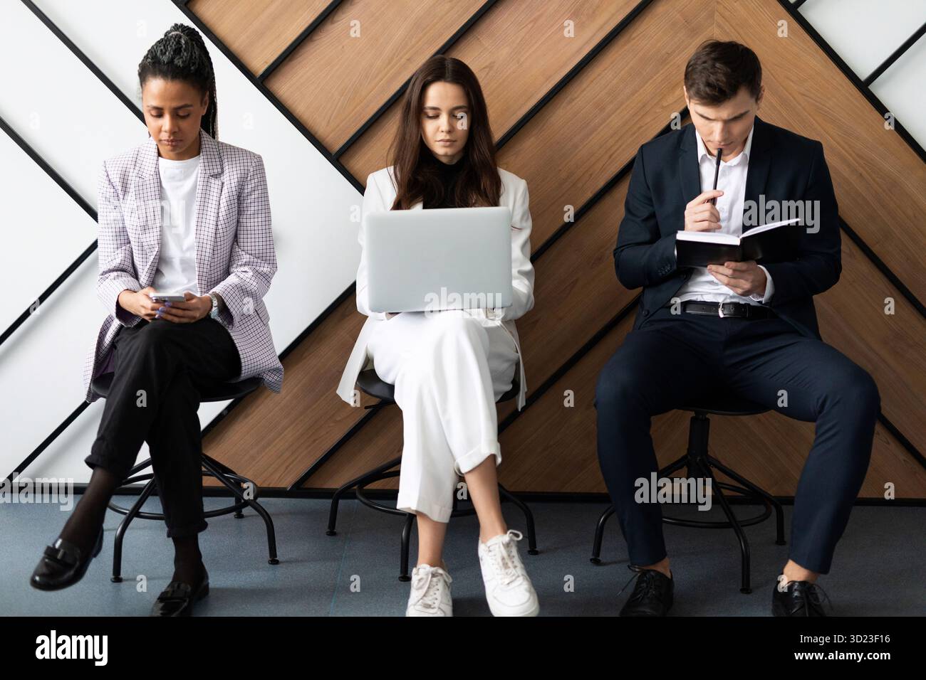 Three candidates competing for one position Stock Photo