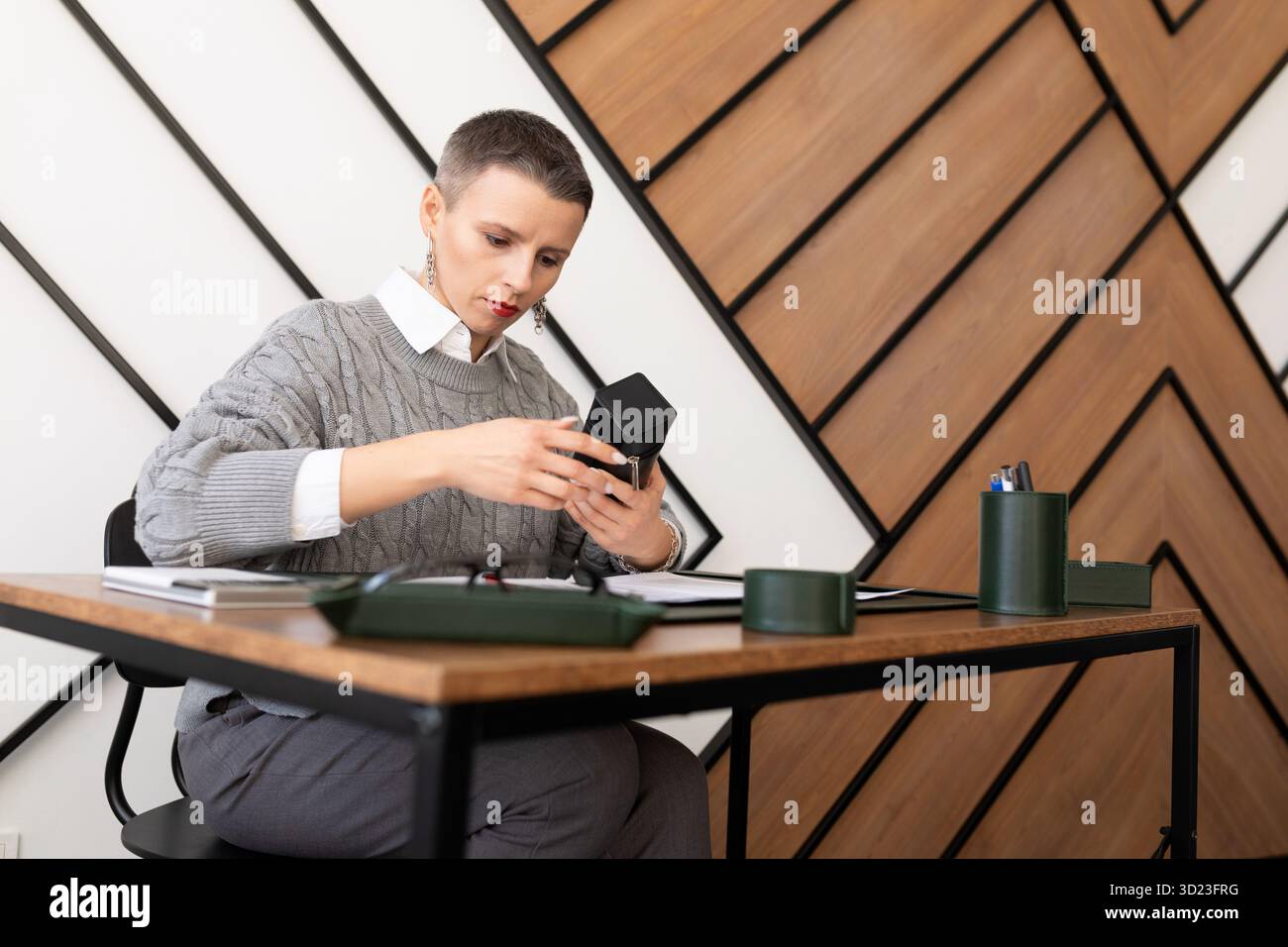 Business woman working in the office at the table Stock Photo