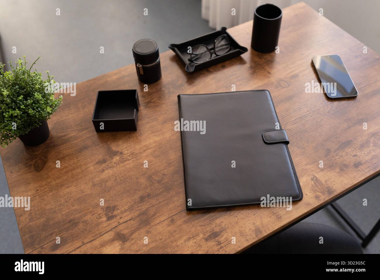 Leather folder for documents on the desktop in the office Stock Photo