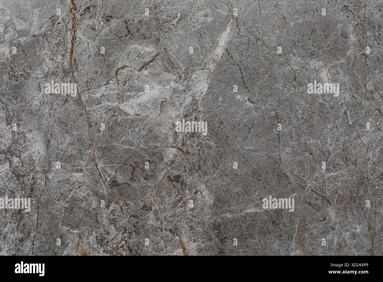 Natural gray marble texture with unique veining and patterns from a quarry setting Stock Photo