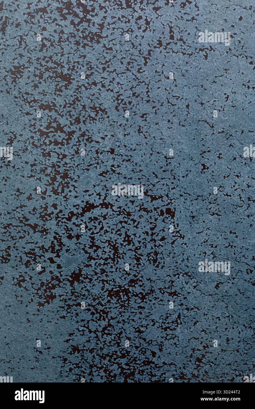 Surface with textured design featuring varying shades of blue and black, perfect for artistic backgrounds or decorative purposes Stock Photo
