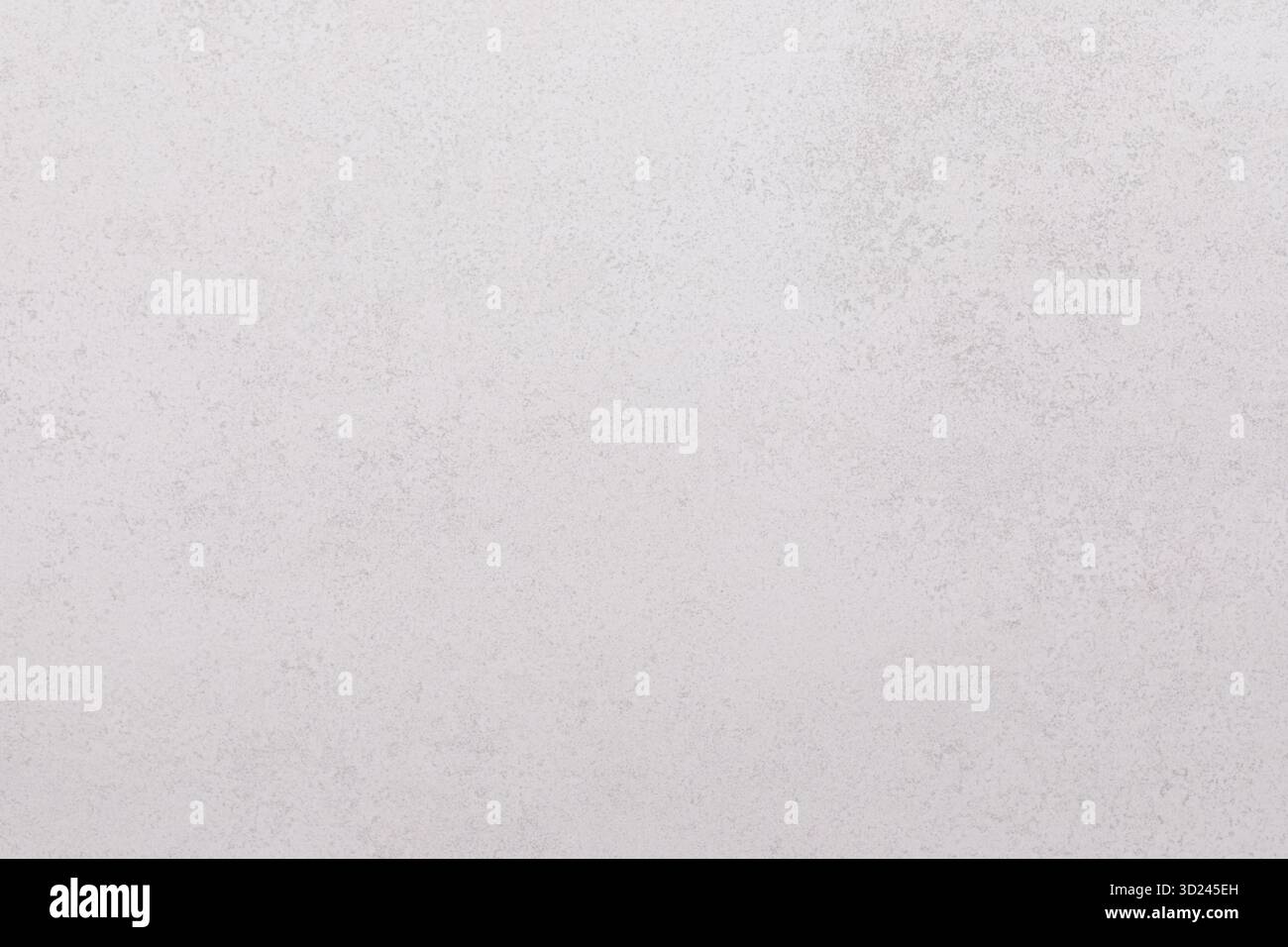 Smooth light gray surface with subtle texture on a neutral background in natural light setting Stock Photo