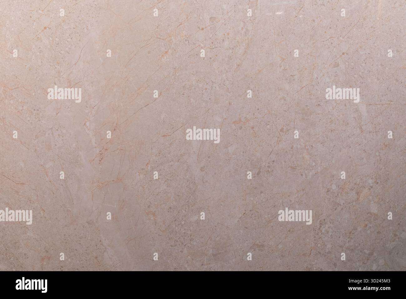 Elegant beige marble surface with subtle texture viewed in natural light Stock Photo