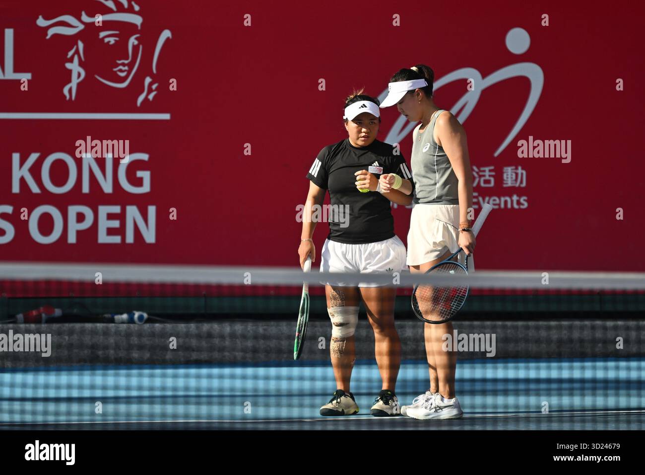 Chinese tennis player Shuo Feng and Taipei tennis player En-Shuo Liang ...