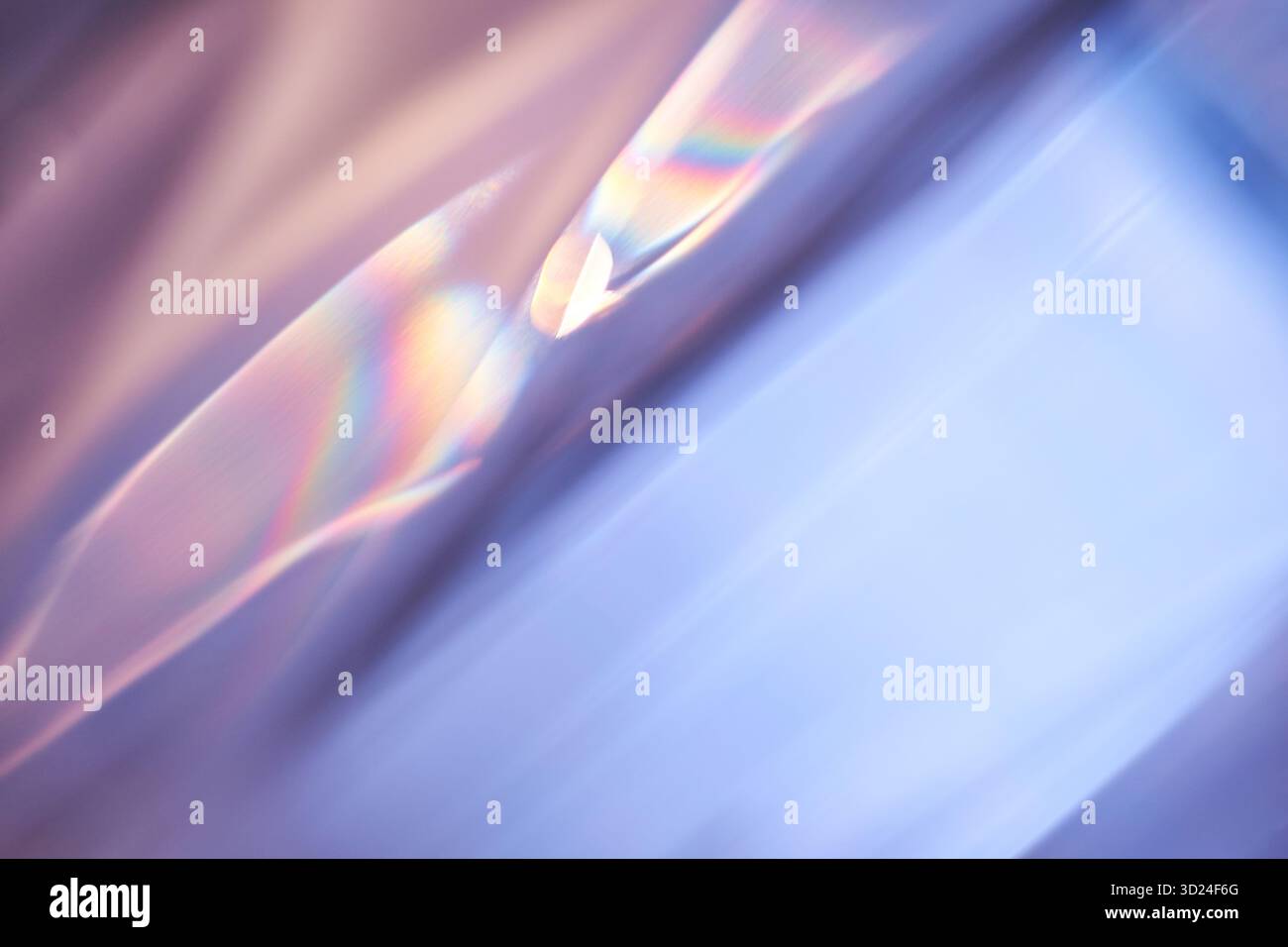 Abstract light refraction with soft pastel colors creating a playful rainbow Stock Photo