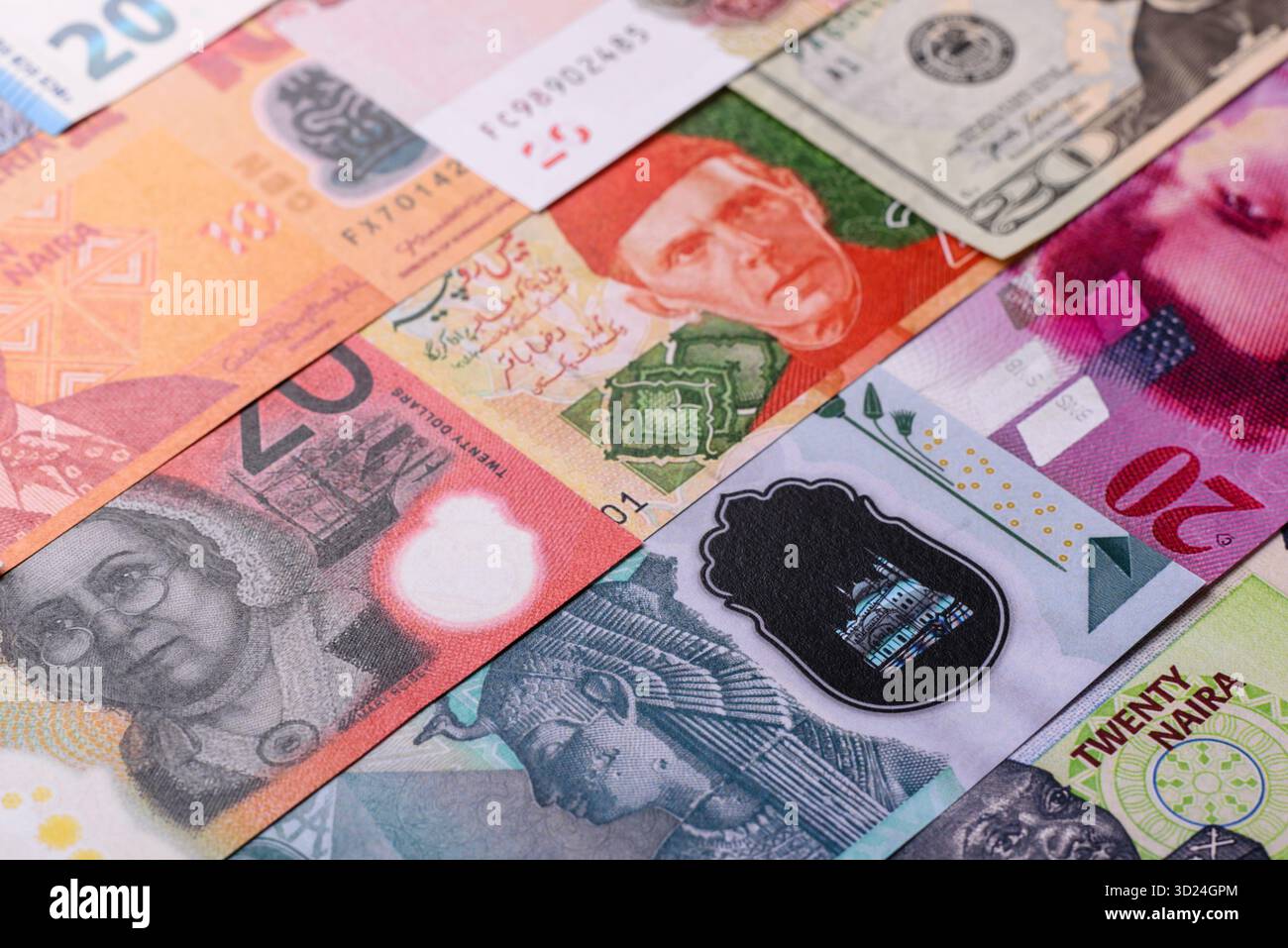 Paper money, banknotes of different countries as a business background. Paper money and cash Stock Photo
