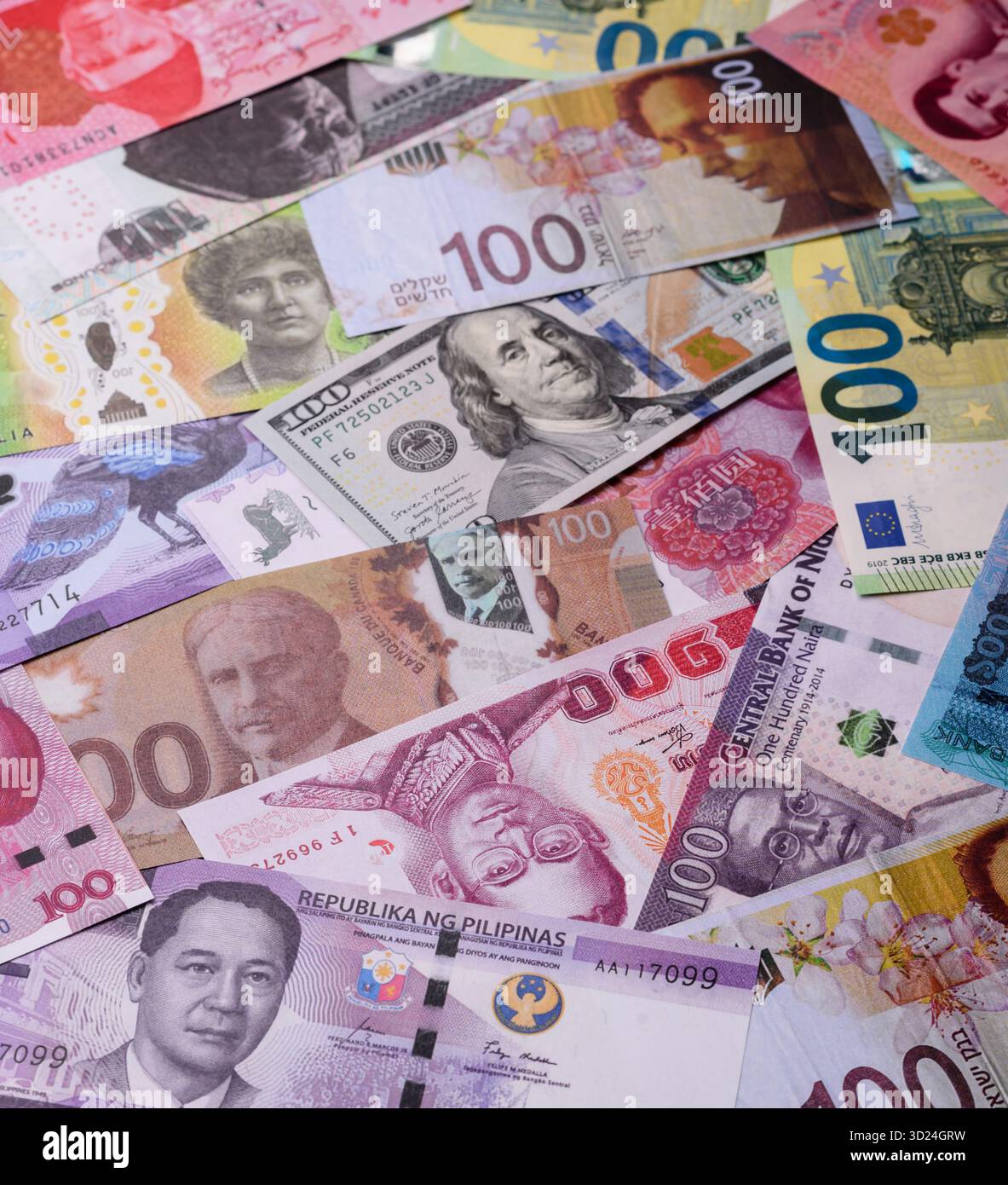 Paper money, banknotes of different countries as a business background. Paper money and cash Stock Photo