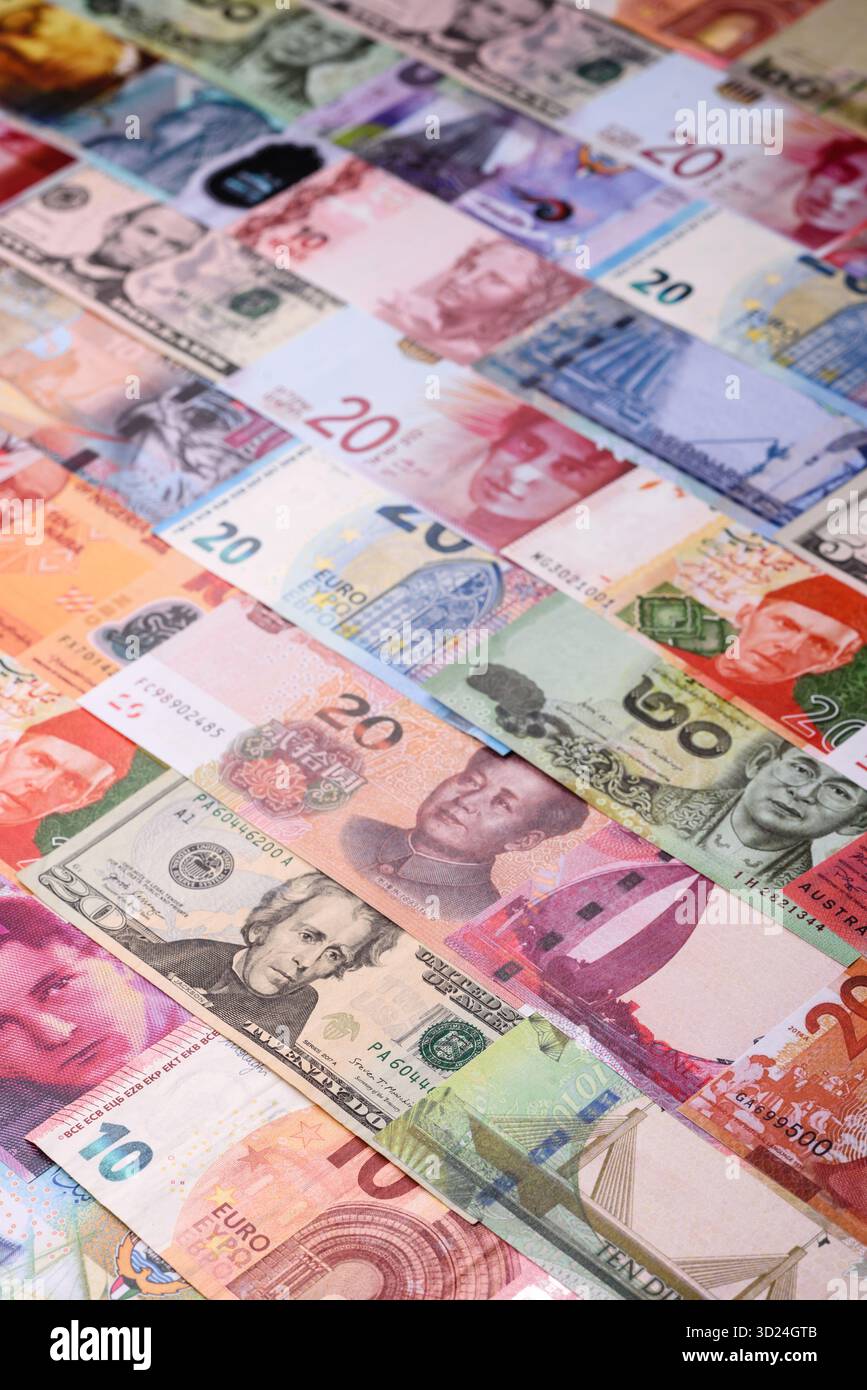 Paper money, banknotes of different countries as a business background. Paper money and cash Stock Photo