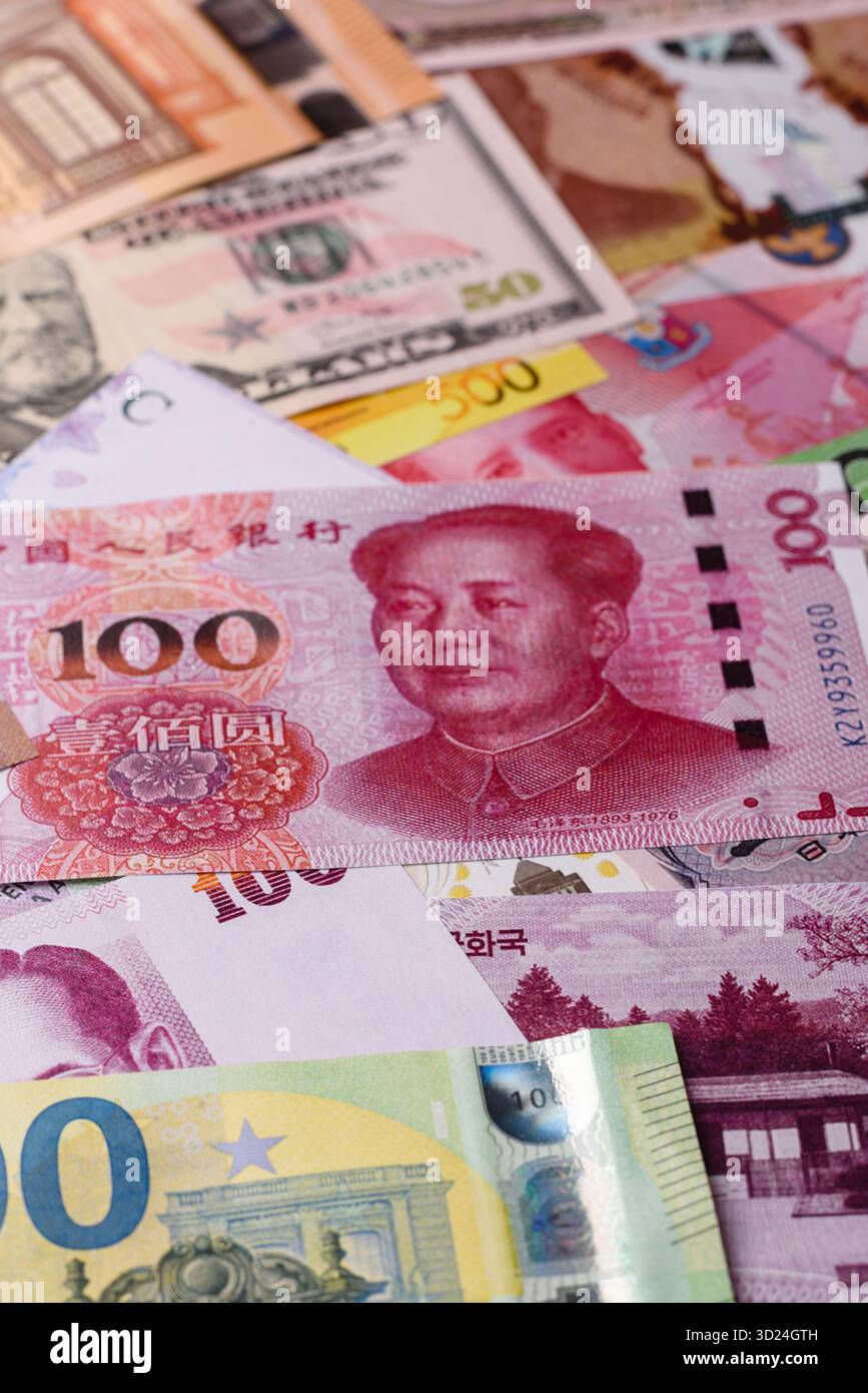 Paper money, banknotes of different countries as a business background. Paper money and cash Stock Photo
