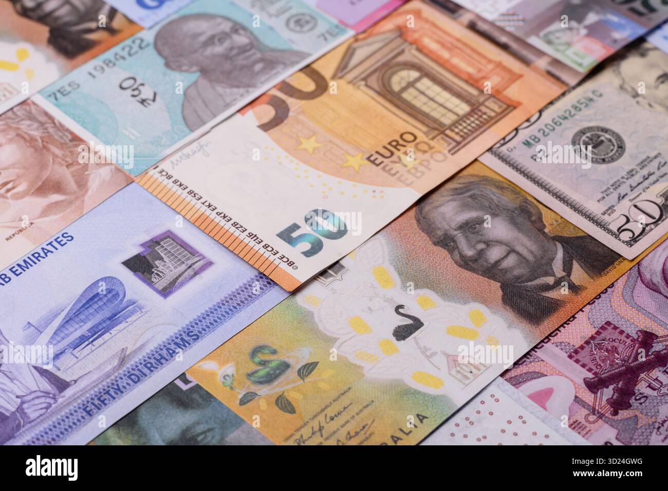 Paper money, banknotes of different countries as a business background. Paper money and cash Stock Photo