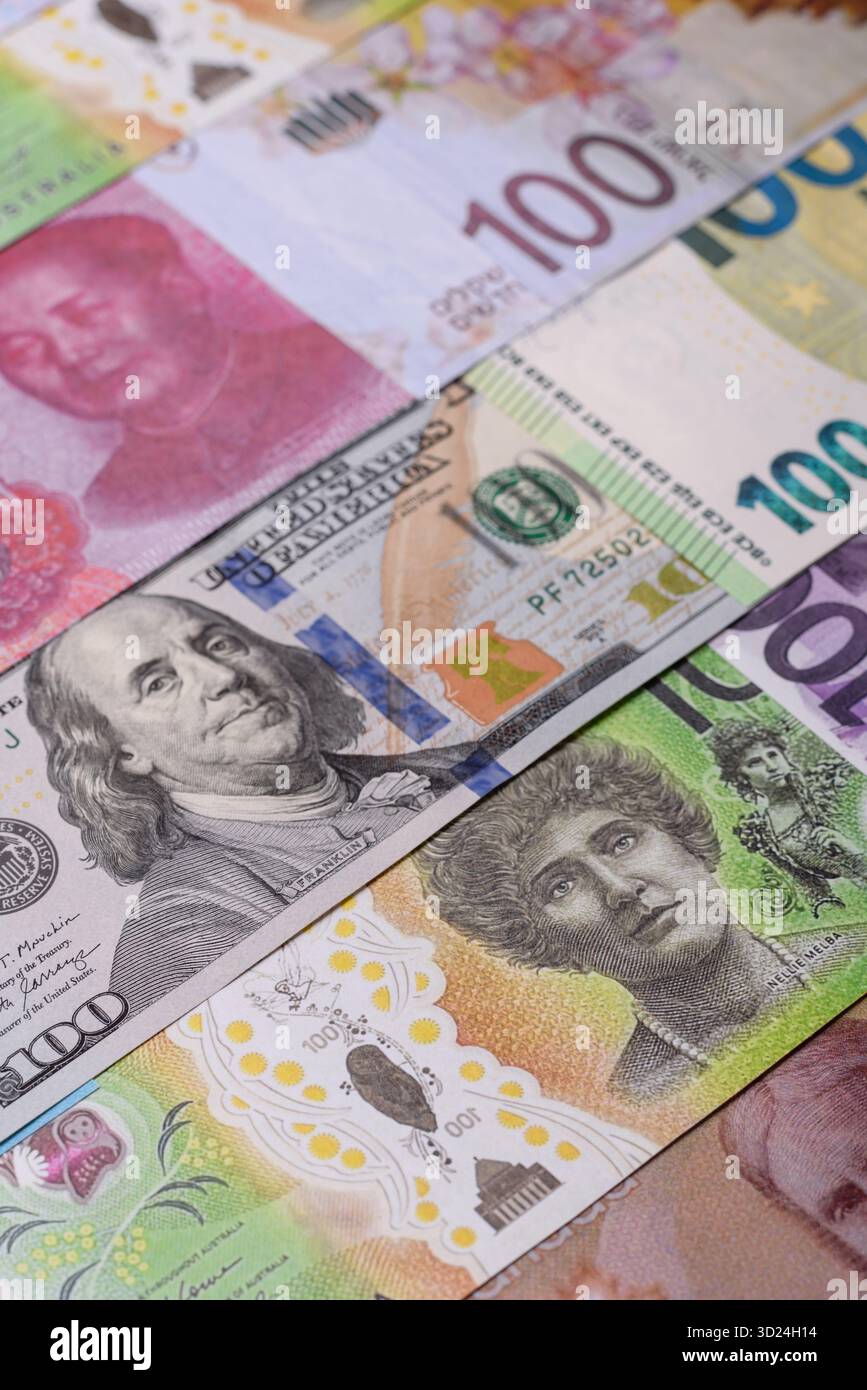 Paper money, banknotes of different countries as a business background. Paper money and cash Stock Photo