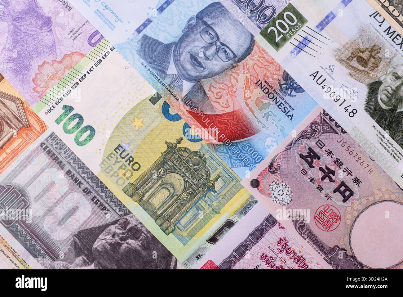 Paper money, banknotes of different countries as a business background. Paper money and cash Stock Photo