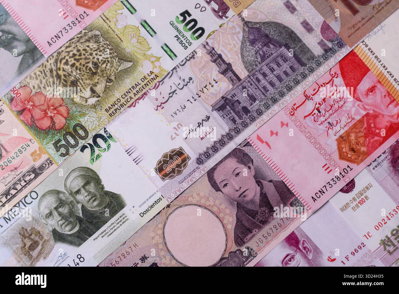 Paper money, banknotes of different countries as a business background. Paper money and cash Stock Photo