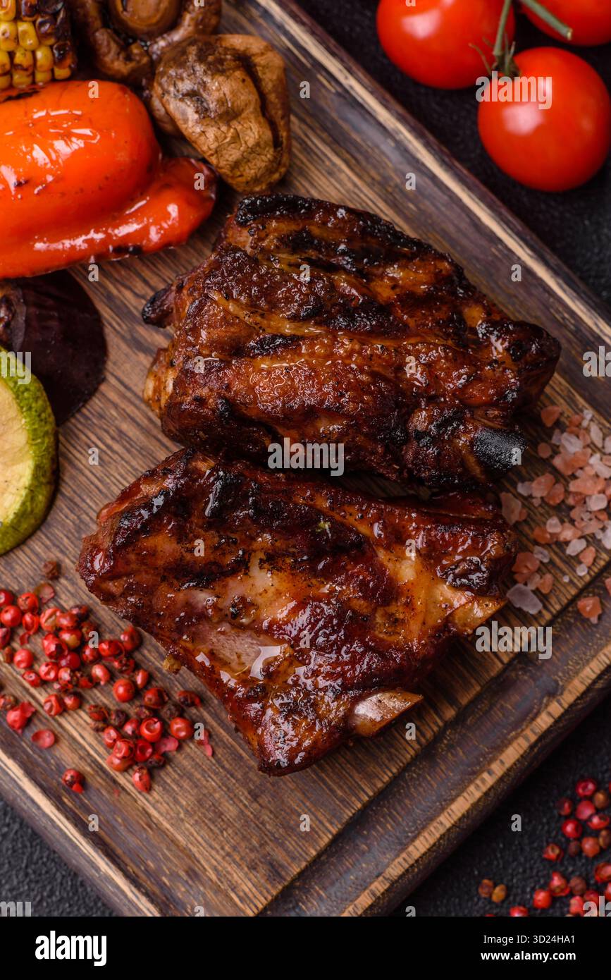 Grilled or barbecued pork ribs with sauce. Grilled ribs Stock Photo
