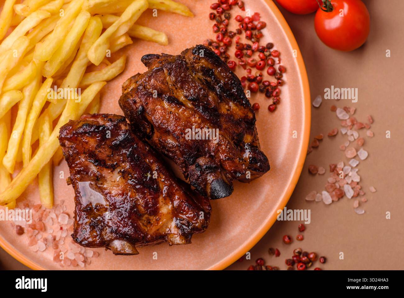 Grilled or barbecued pork ribs with sauce. Grilled ribs Stock Photo