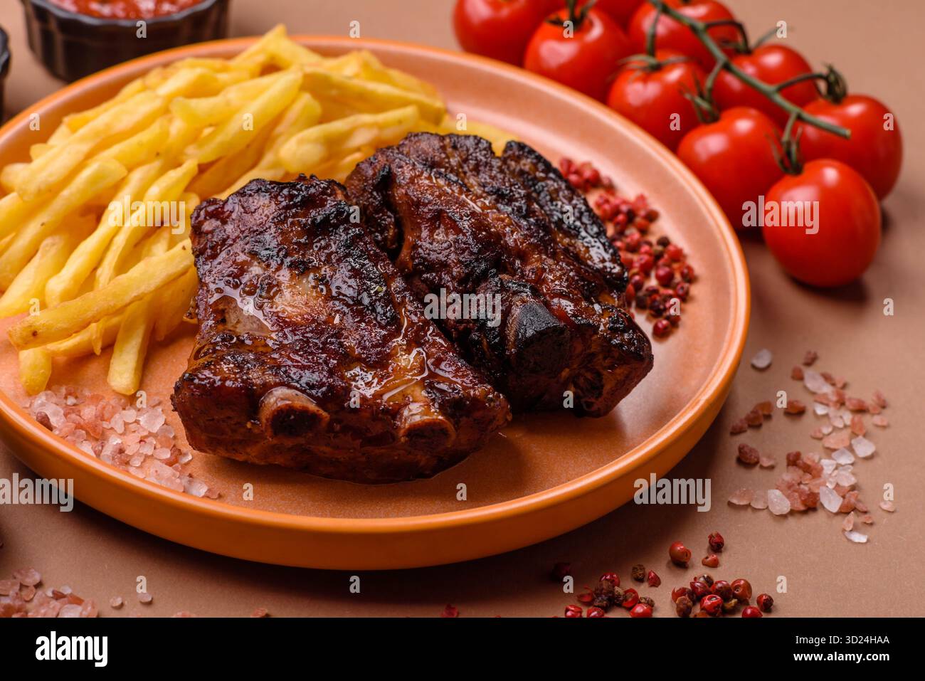 Grilled or barbecued pork ribs with sauce. Grilled ribs Stock Photo