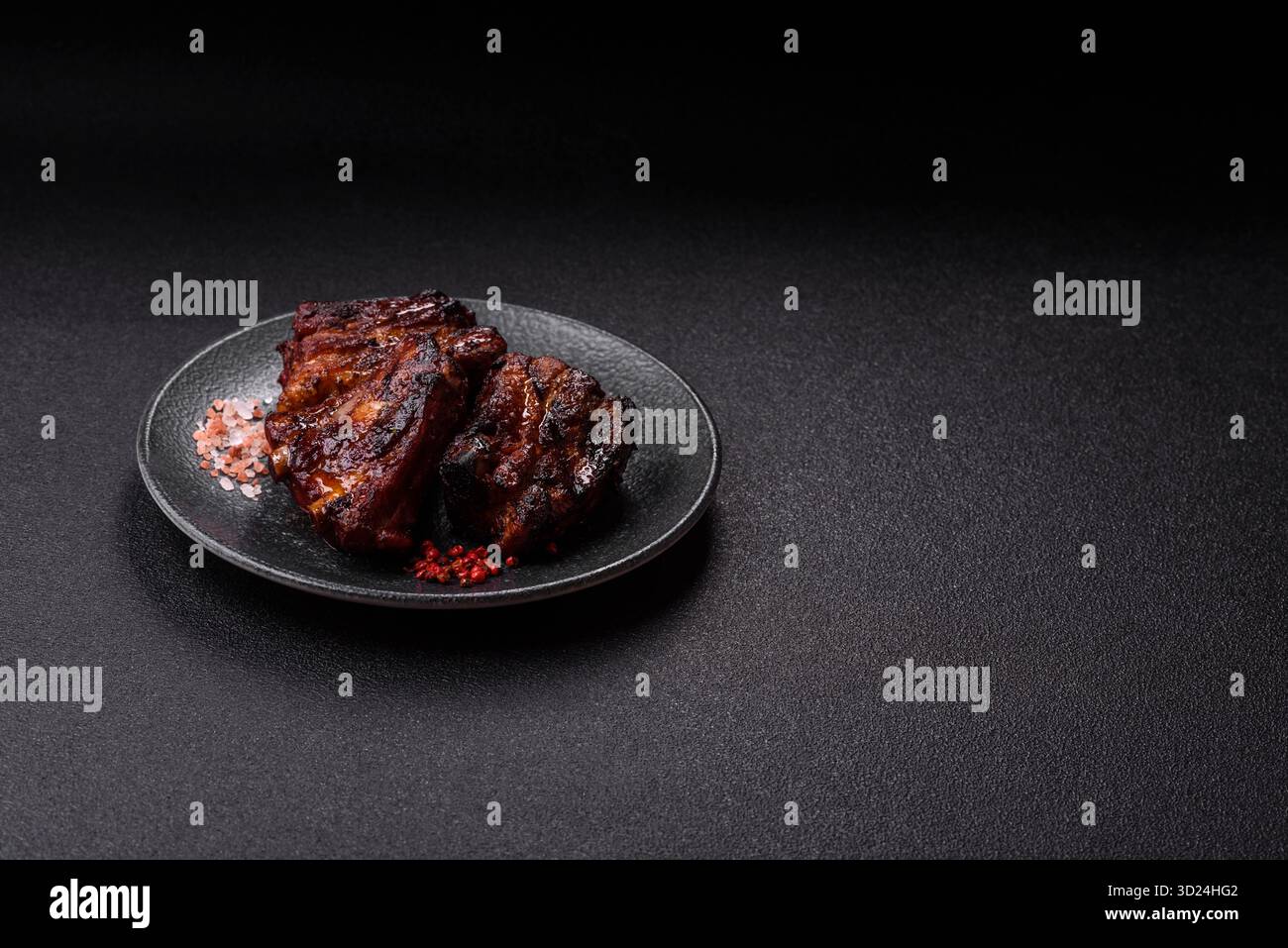 Grilled or barbecued pork ribs with sauce. Grilled ribs Stock Photo